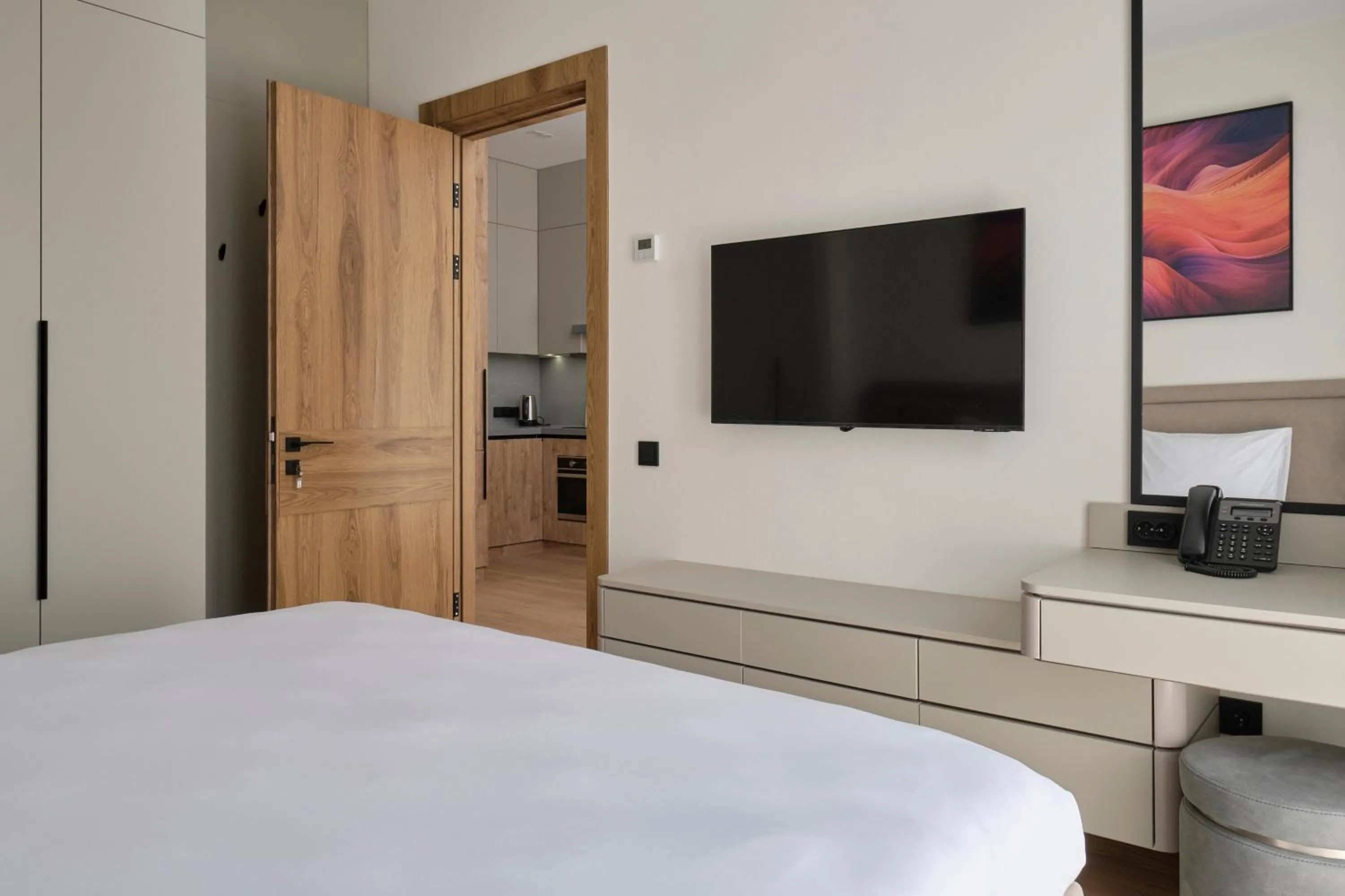 Bed in STYLO Residences & Suites