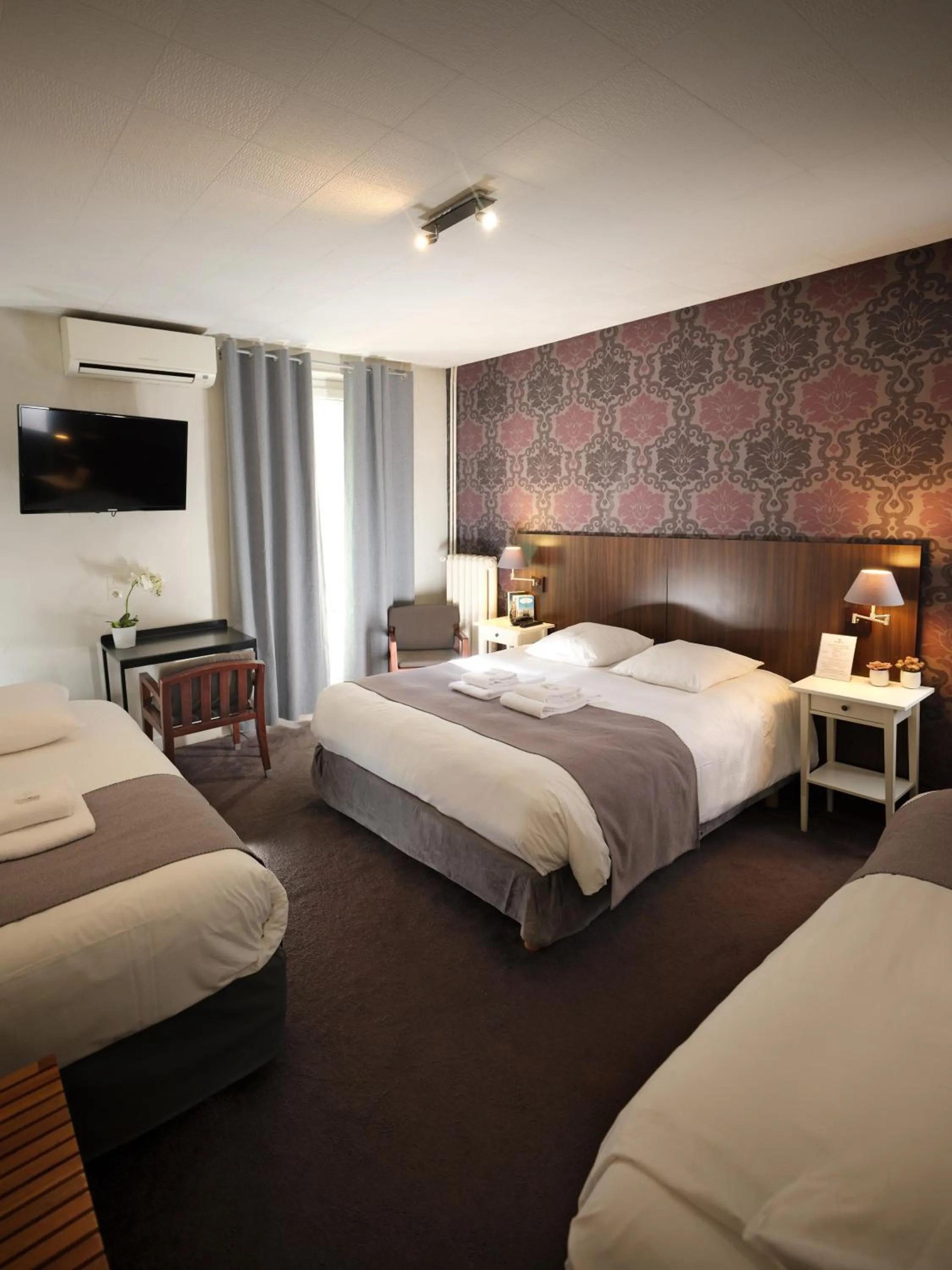 Bed in Hotel Les Negociants