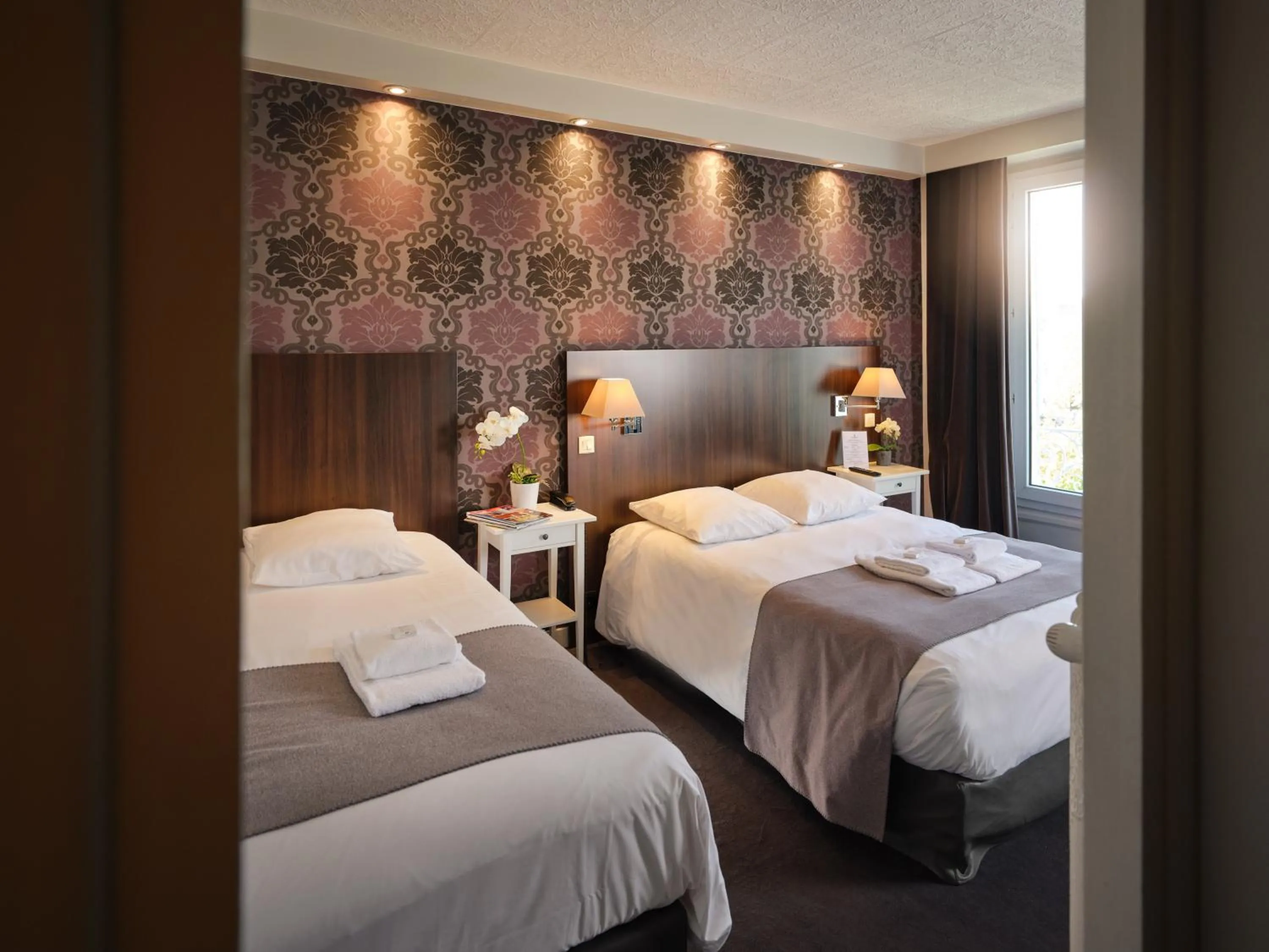 Bed in Hotel Les Negociants