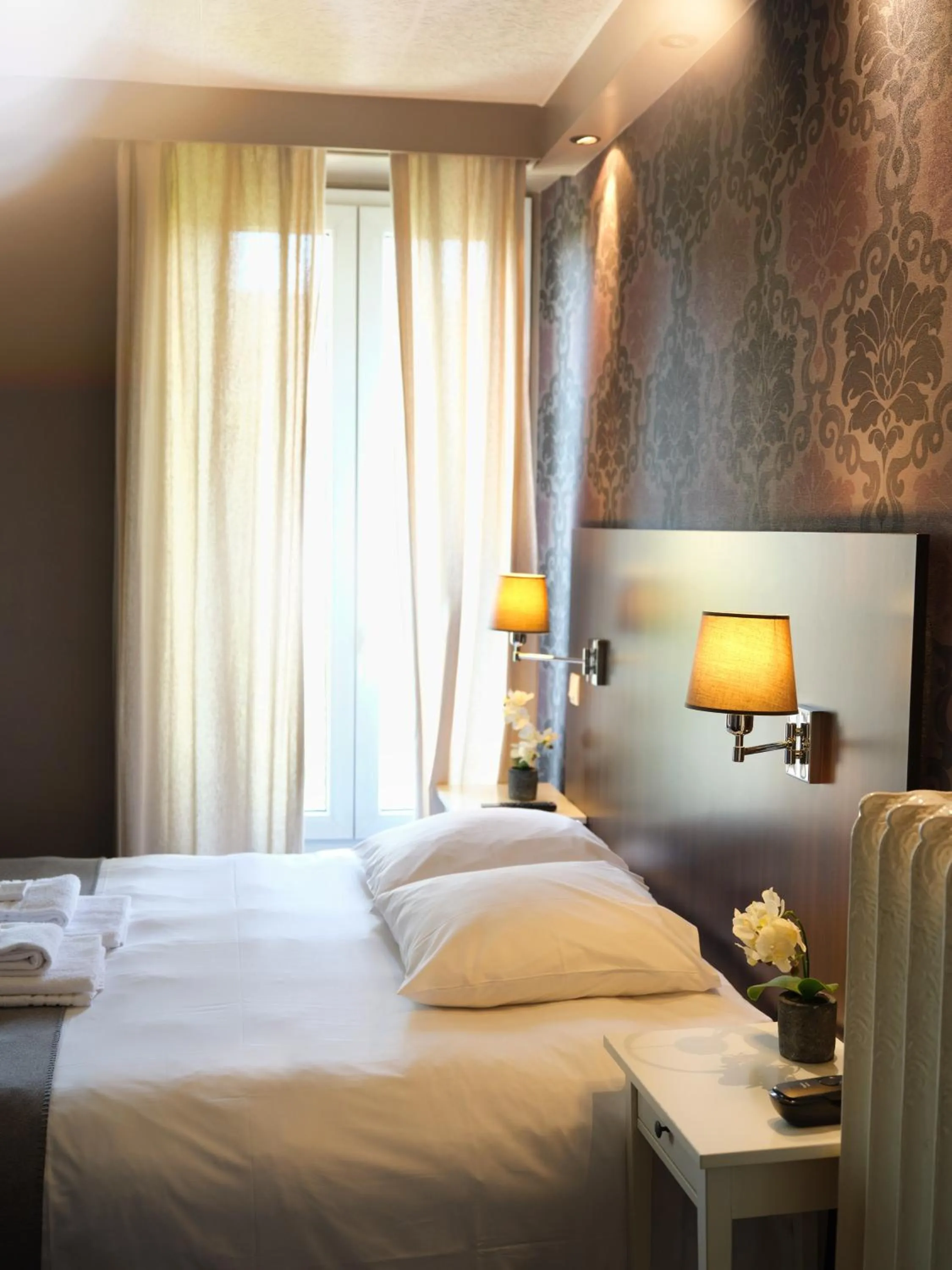 Bed in Hotel Les Negociants