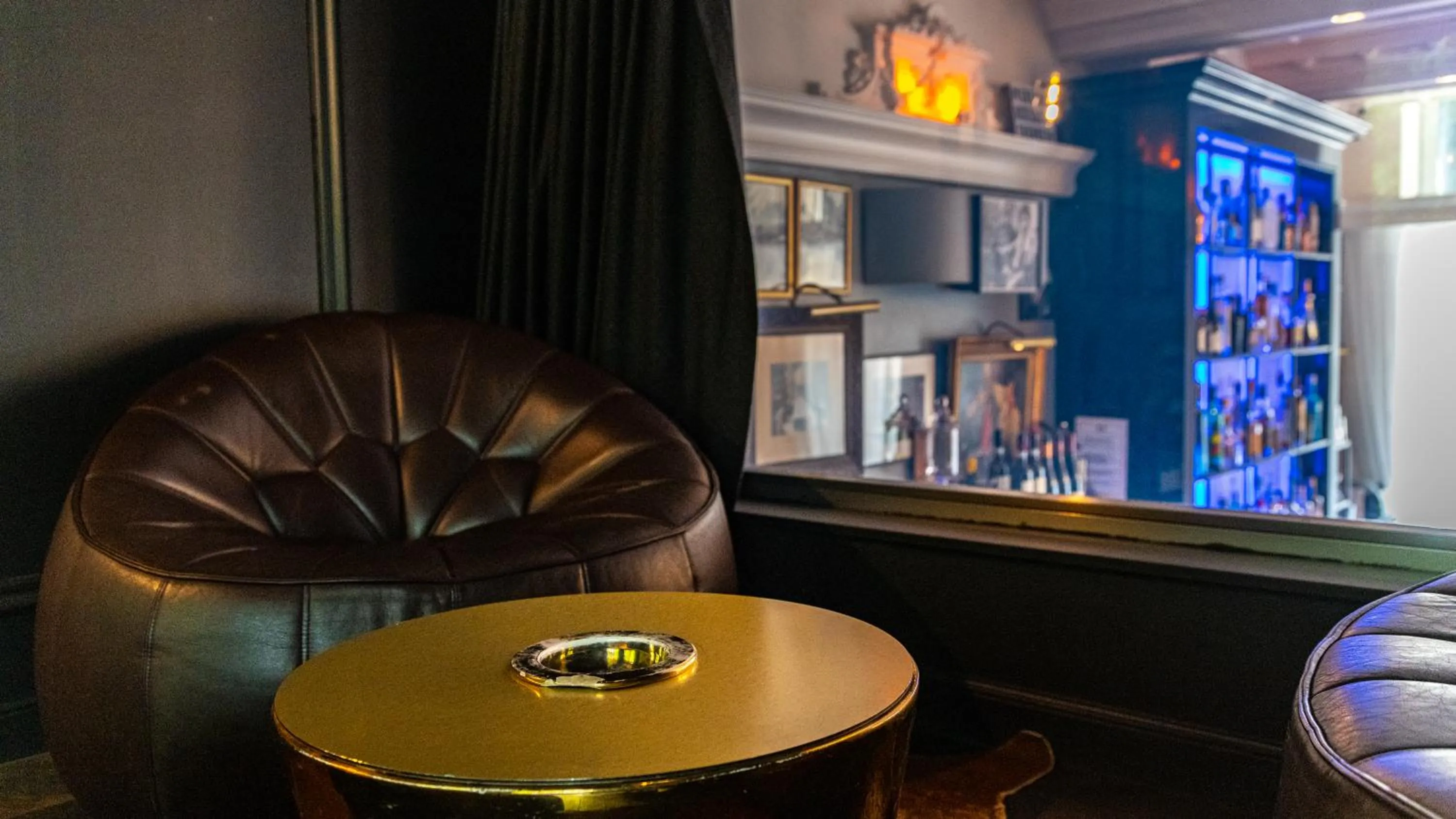 Communal lounge/ TV room in Vertigo Hotel, By Marriott, a Member of Design Hotels