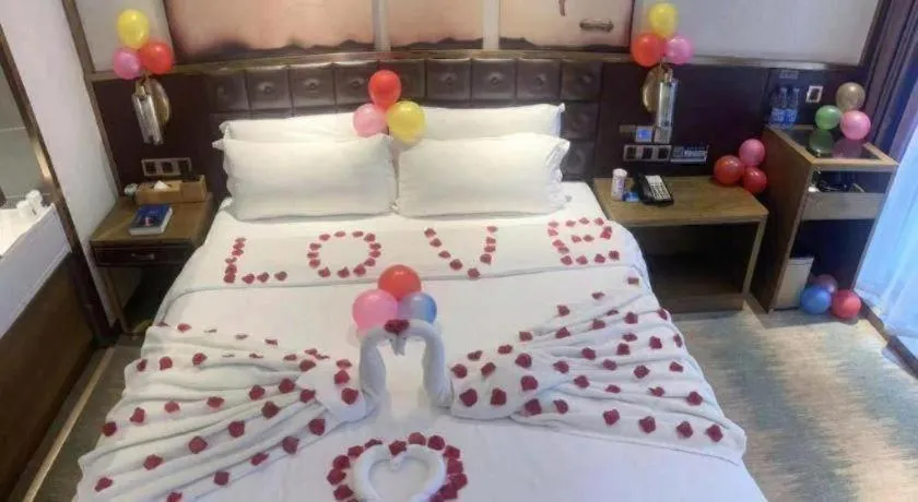 Bed in James Joyce Coffetel Shijiazhuang Wanda Plaza Tangu Metro Station