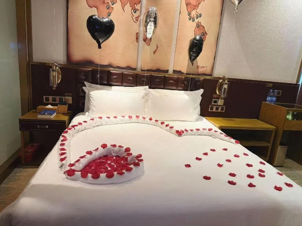 Bed in James Joyce Coffetel Shijiazhuang Wanda Plaza Tangu Metro Station