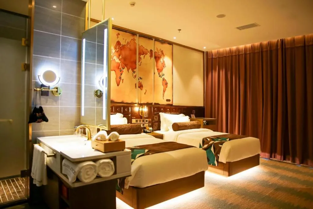 Bed in James Joyce Coffetel Shijiazhuang Wanda Plaza Tangu Metro Station