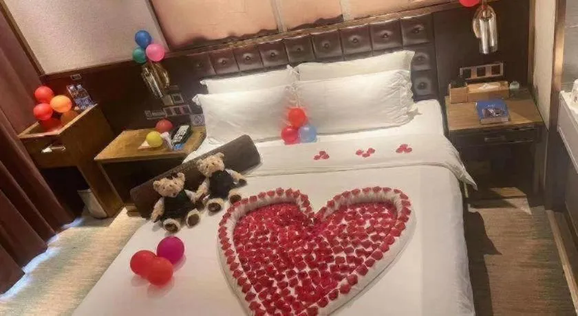 Bed in James Joyce Coffetel Shijiazhuang Wanda Plaza Tangu Metro Station