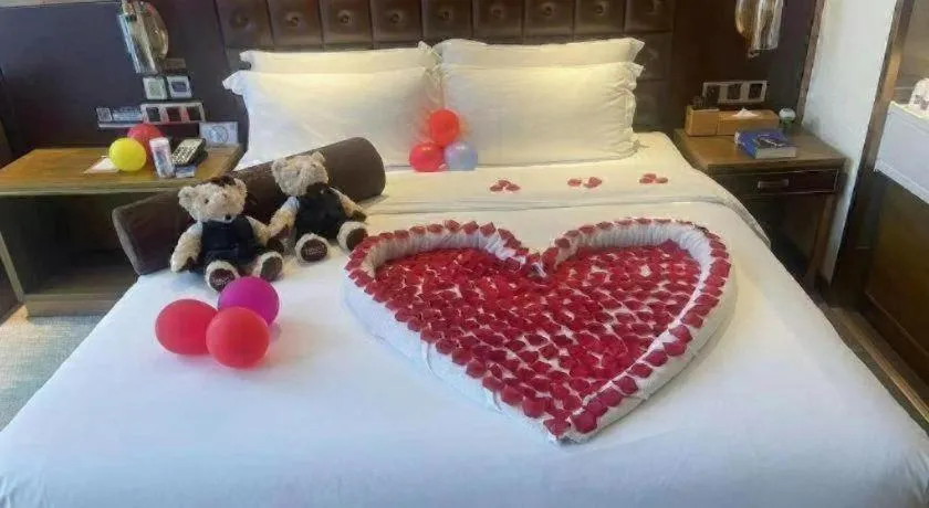 Bed in James Joyce Coffetel Shijiazhuang Wanda Plaza Tangu Metro Station