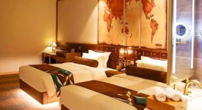 Bed in James Joyce Coffetel Shijiazhuang Wanda Plaza Tangu Metro Station