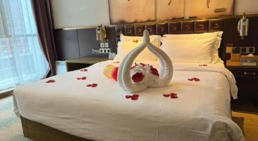 Bed in James Joyce Coffetel Shijiazhuang Wanda Plaza Tangu Metro Station