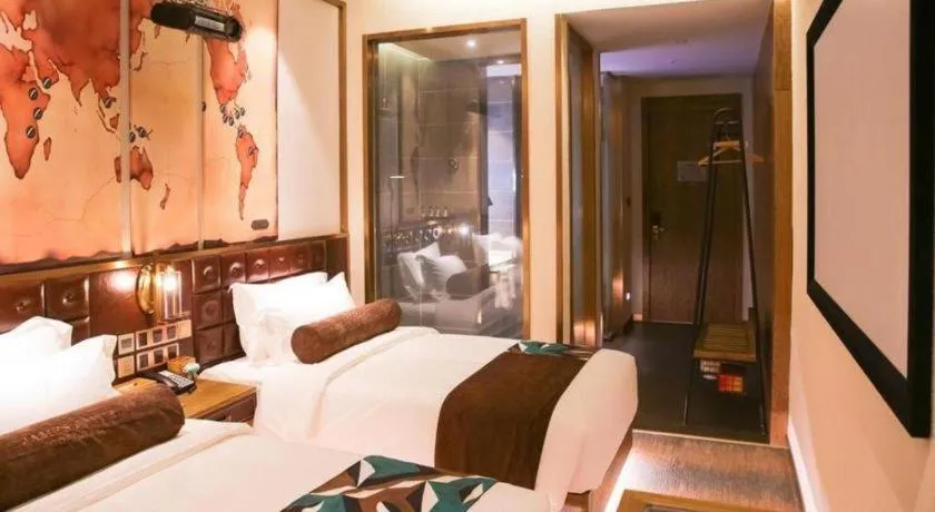Bed in James Joyce Coffetel Shijiazhuang Wanda Plaza Tangu Metro Station