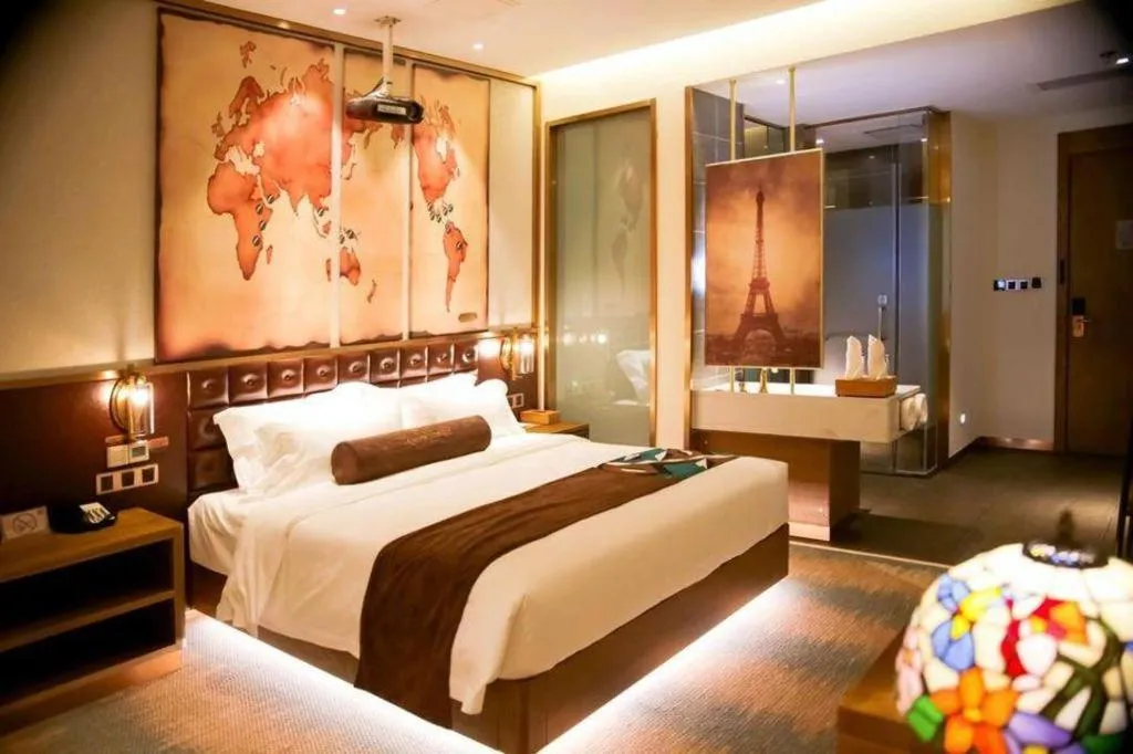 Bed in James Joyce Coffetel Shijiazhuang Wanda Plaza Tangu Metro Station