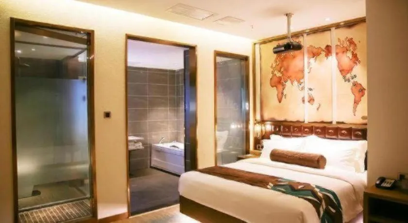 Bed in James Joyce Coffetel Shijiazhuang Wanda Plaza Tangu Metro Station