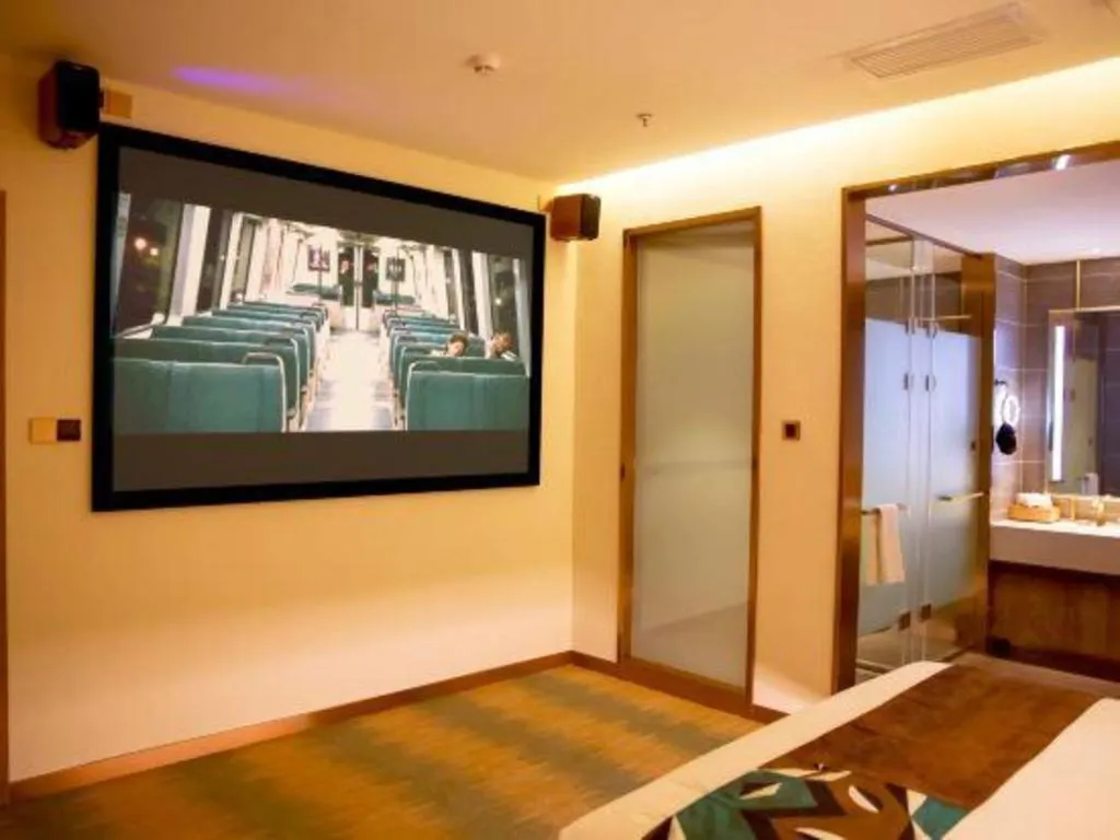 Bed in James Joyce Coffetel Shijiazhuang Wanda Plaza Tangu Metro Station