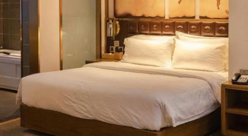 Bed in James Joyce Coffetel Shijiazhuang Wanda Plaza Tangu Metro Station