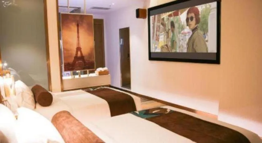 Bed in James Joyce Coffetel Shijiazhuang Wanda Plaza Tangu Metro Station