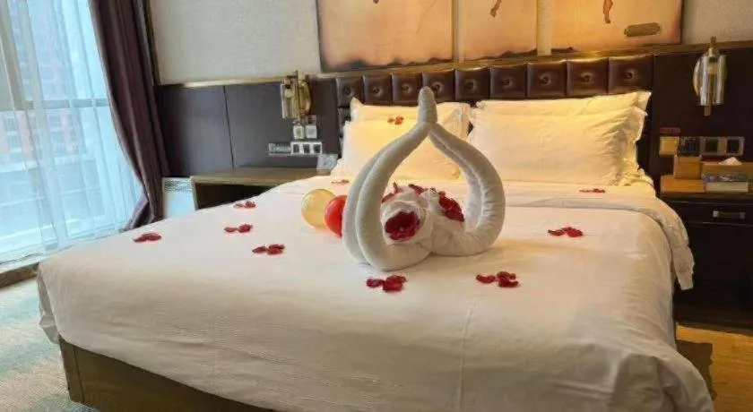 Bed in James Joyce Coffetel Shijiazhuang Wanda Plaza Tangu Metro Station