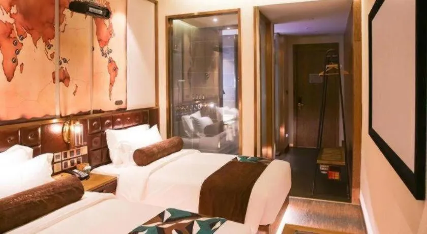 Bed in James Joyce Coffetel Shijiazhuang Wanda Plaza Tangu Metro Station