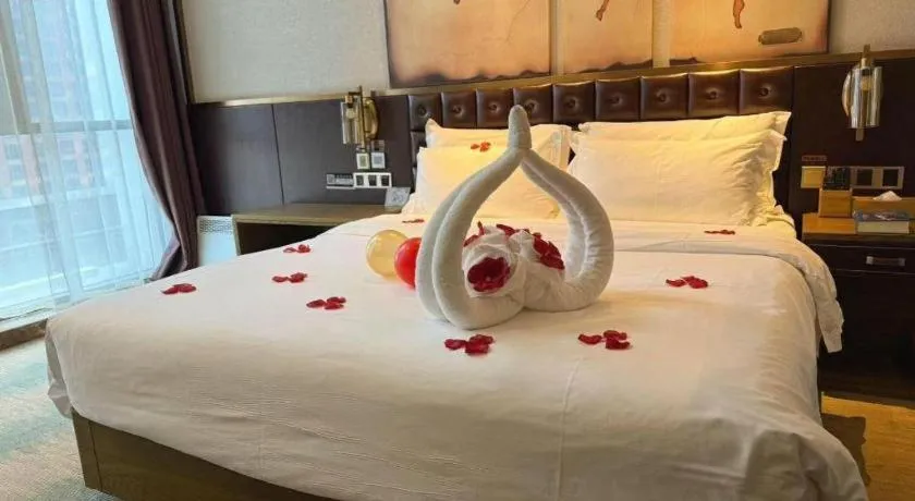 Bed in James Joyce Coffetel Shijiazhuang Wanda Plaza Tangu Metro Station