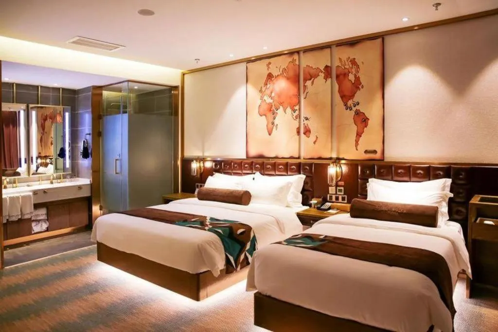 Bed in James Joyce Coffetel Shijiazhuang Wanda Plaza Tangu Metro Station