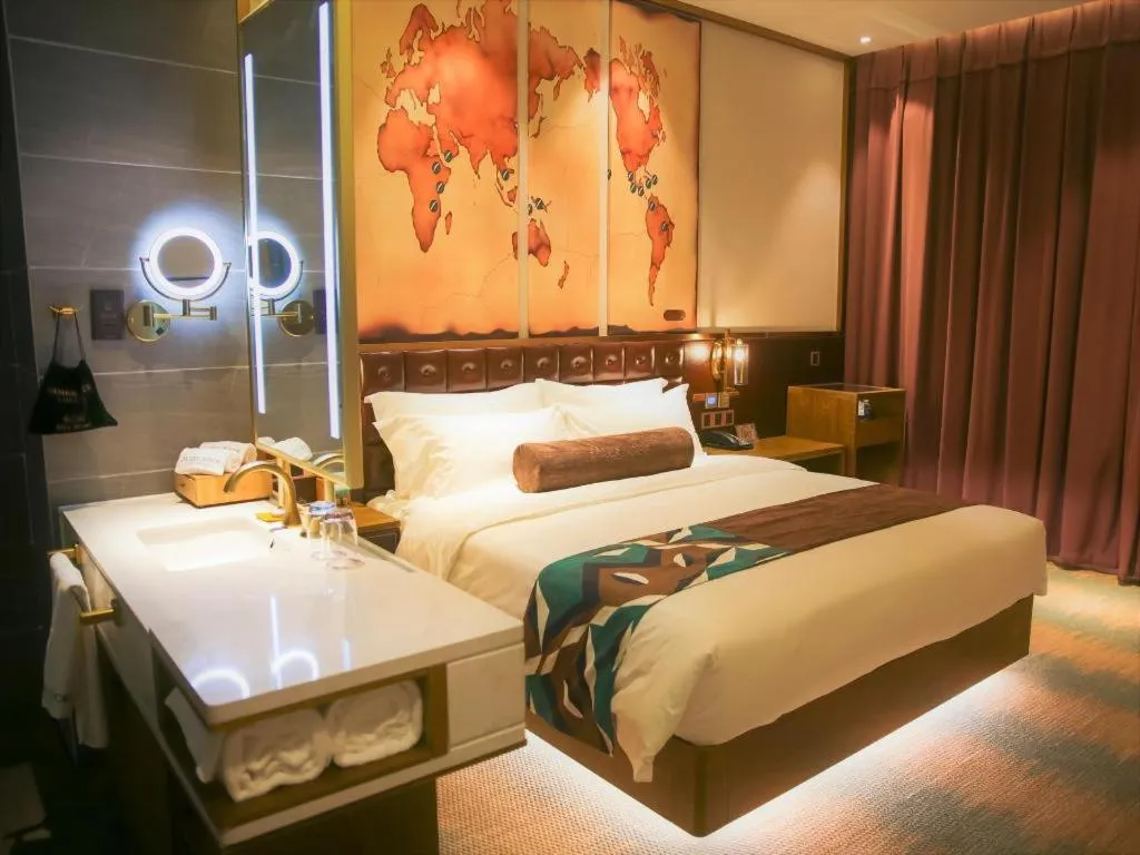 Bed in James Joyce Coffetel Shijiazhuang Wanda Plaza Tangu Metro Station