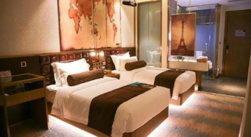 Bed in James Joyce Coffetel Shijiazhuang Wanda Plaza Tangu Metro Station