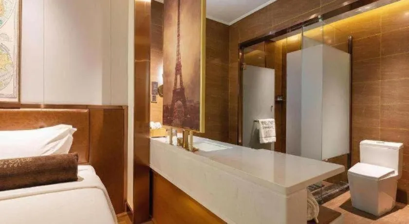 Bed in James Joyce Coffetel Anyang Railway Station Wenfeng Avenue Yinxu Scenic Spot