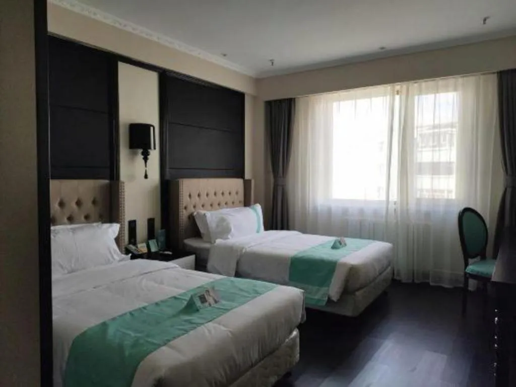 Bed in Xana Hotelle Yining Airport Road Jinwuyuan