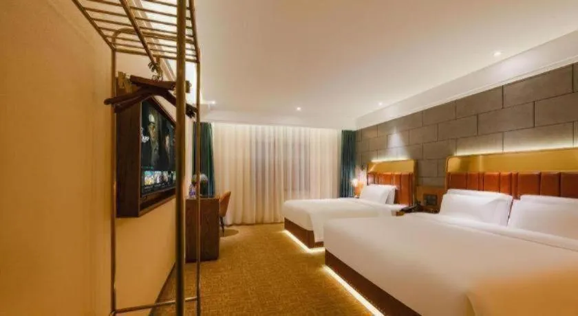 Bed in James Joyce Coffetel Tianjin Railway Station