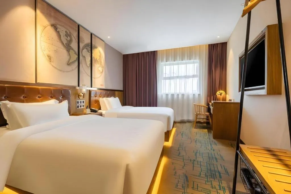 Bed in James Joyce Coffetel Tianjin Railway Station