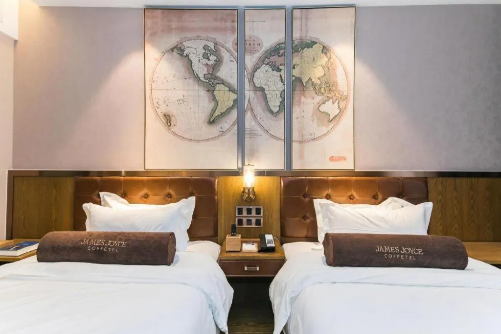 Bed in James Joyce Coffetel Tianjin Railway Station