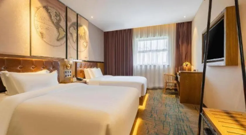 Bed in James Joyce Coffetel Tianjin Railway Station