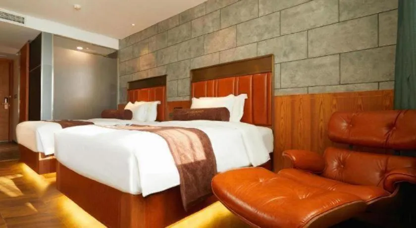 Bed in James Joyce Coffetel Tianjin Railway Station