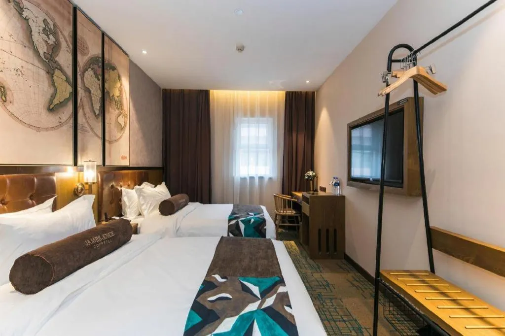 Bed in James Joyce Coffetel Tianjin Railway Station