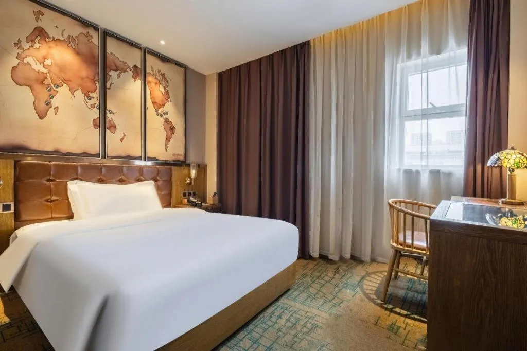 Bed in James Joyce Coffetel Tianjin Railway Station