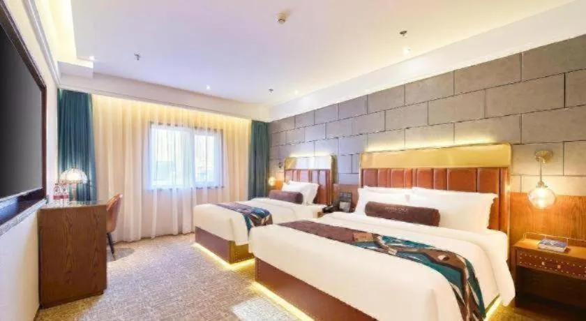 Bed in James Joyce Coffetel Tianjin Railway Station