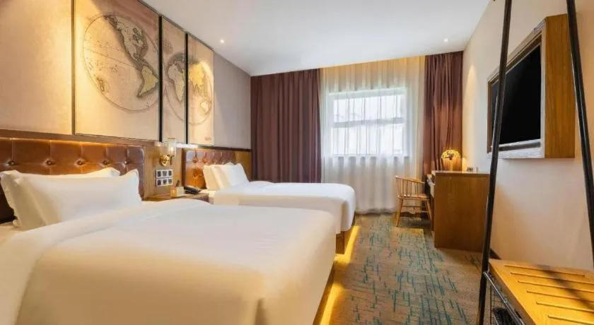 Bed in James Joyce Coffetel Tianjin Railway Station