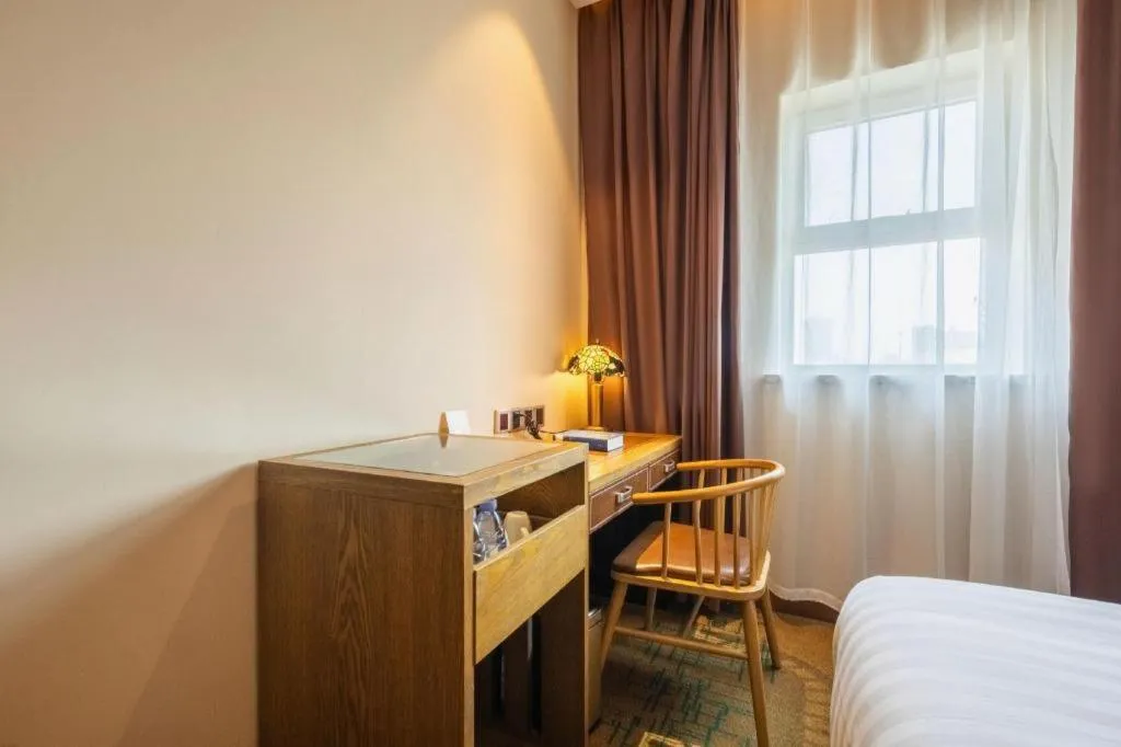 Bed in James Joyce Coffetel Tianjin Railway Station