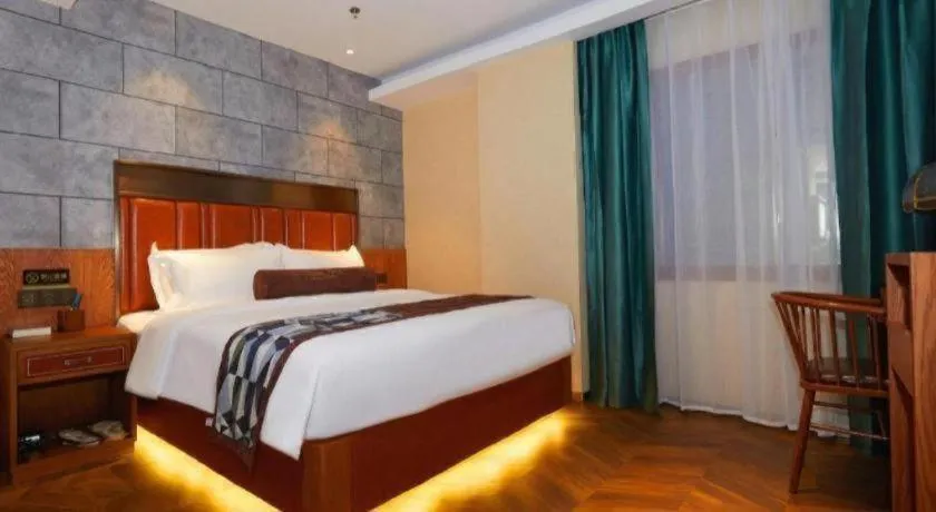 Bed in James Joyce Coffetel Tianjin Railway Station