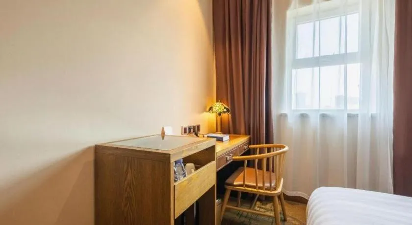 Bed in James Joyce Coffetel Tianjin Railway Station