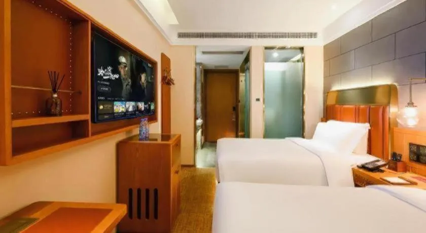 Bed in James Joyce Coffetel Tianjin Railway Station