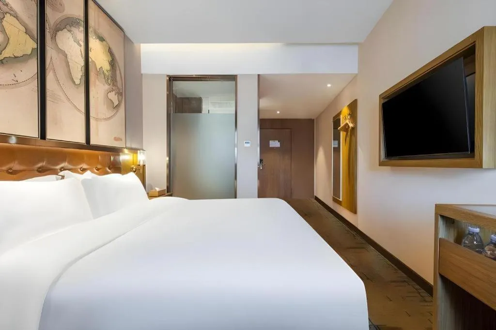 Bed in James Joyce Coffetel Tianjin Railway Station