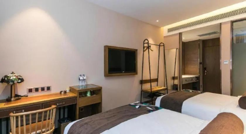 Bed in James Joyce Coffetel Tianjin Railway Station