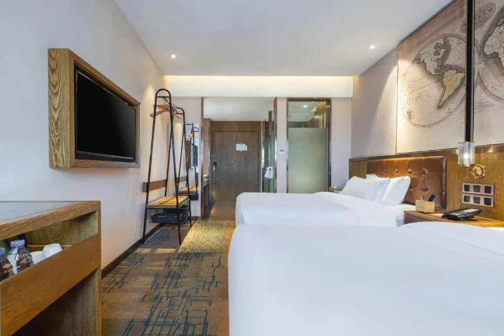 Bed in James Joyce Coffetel Tianjin Railway Station