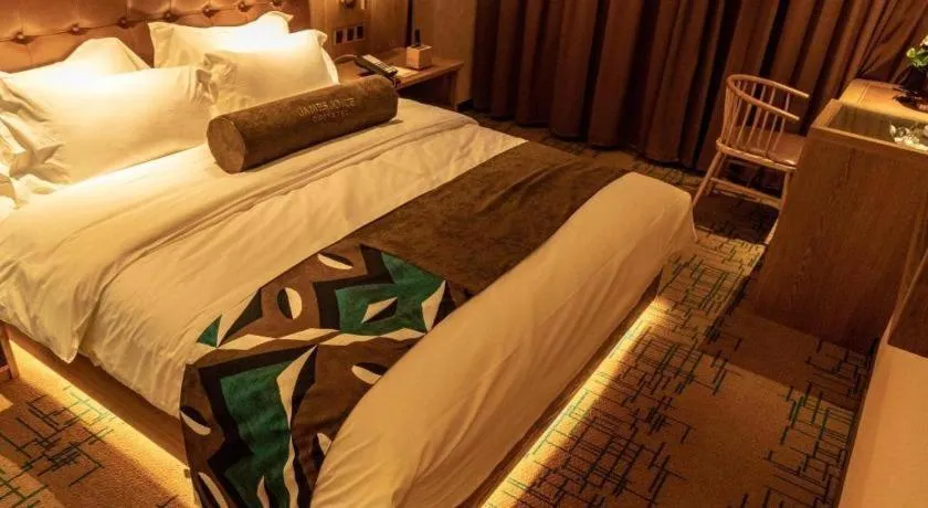 Bed in James Joyce Coffetel Tianjin Railway Station