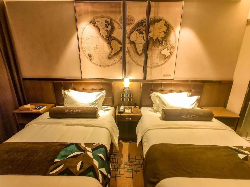 Bed in James Joyce Coffetel Tianjin Railway Station