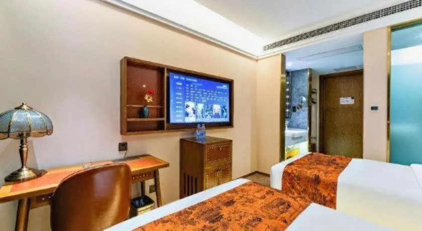 Bed in James Joyce Coffetel Tianjin Railway Station