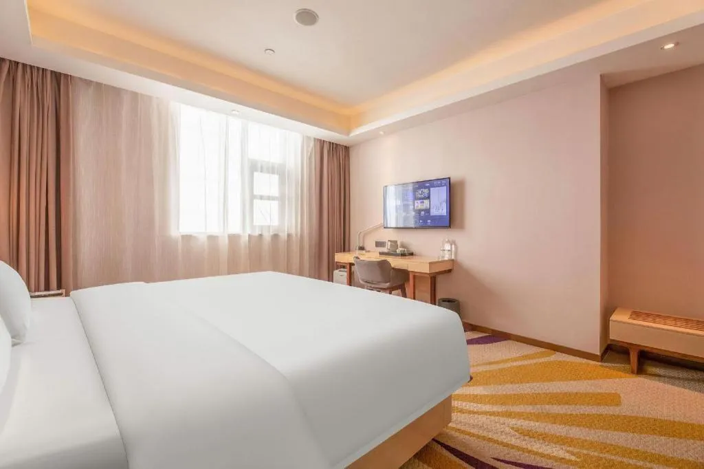 Bed in Lavande Hotels Jinzhong Youjian Pingyao