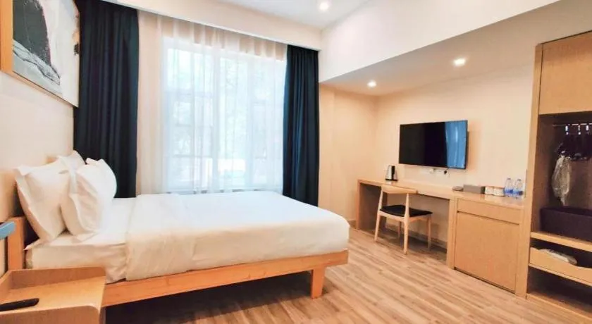 Bed in ZMAX Hotels Wuhan East Lake