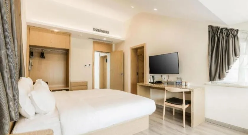 Bed in ZMAX Hotels Wuhan East Lake