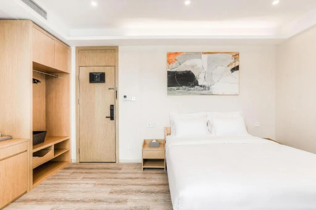 Bed in ZMAX Hotels Wuhan East Lake