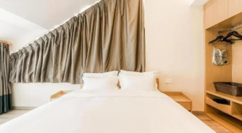 Bed in ZMAX Hotels Wuhan East Lake